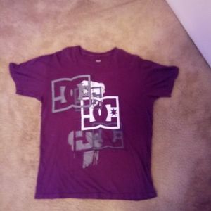 "DC" maroon,grey. And white. Large